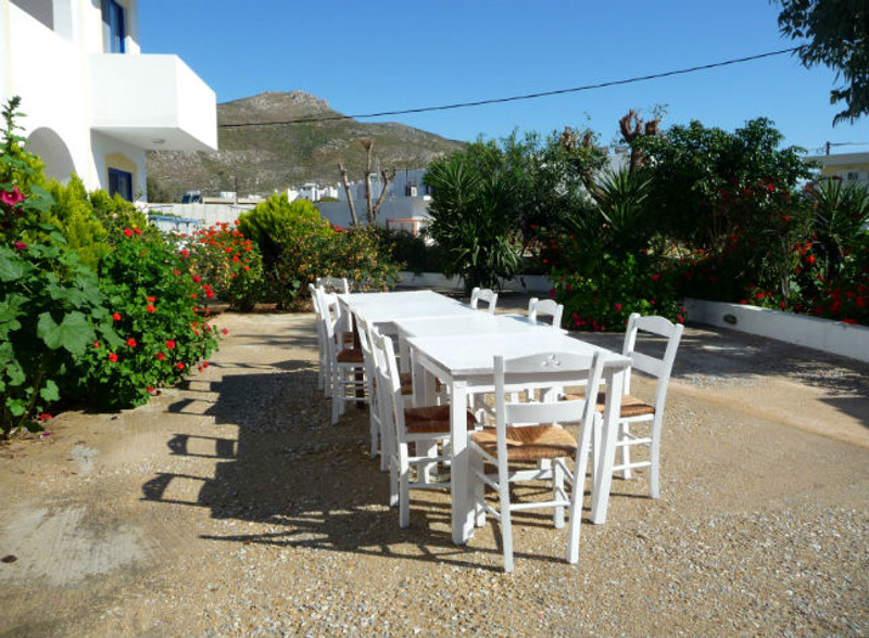 Outdoor seating at Irinoula Studios in Tilos