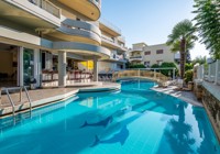 Outdoor pool area at Angela Apartments
