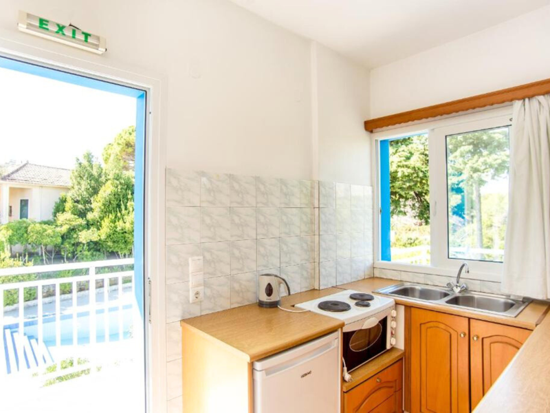 Kitchenette at Blue White Apartments