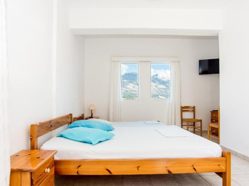 Bedroom at Blue White Apartments