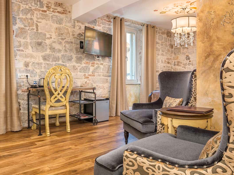 Deluxe Room Living Room Area at Plaza Marchi